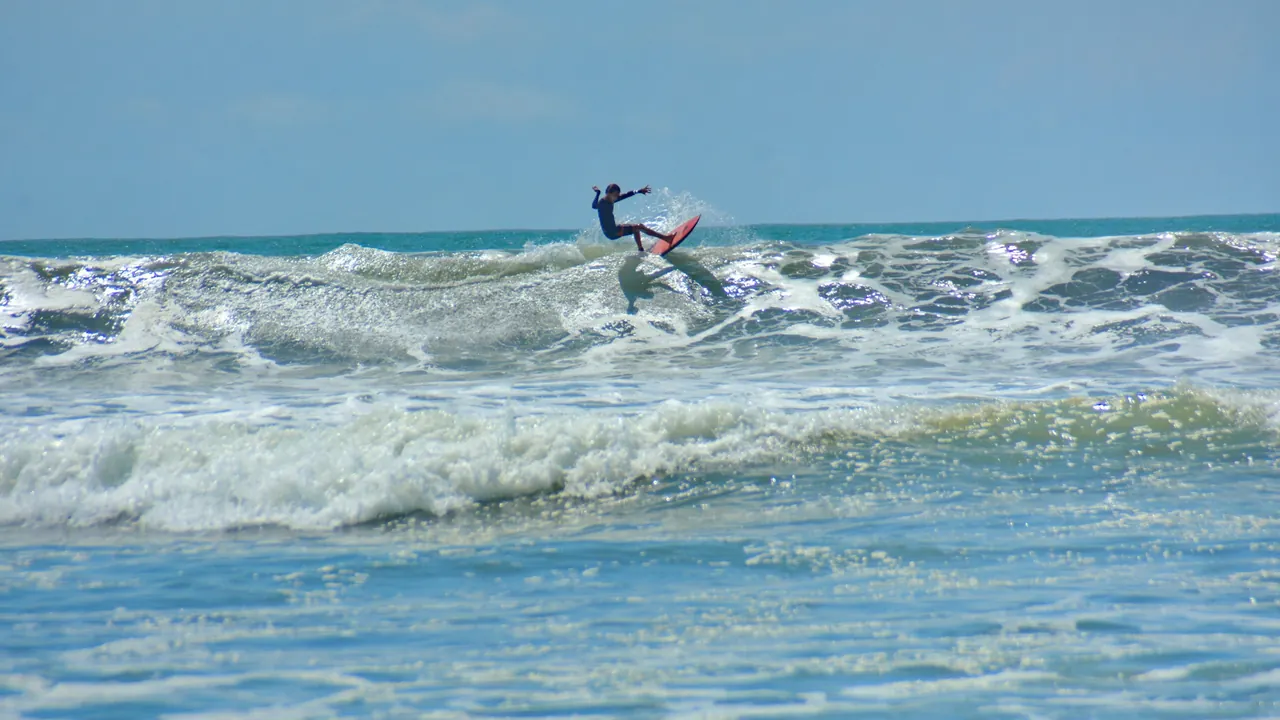 A surfer turns on a breaking wave in Costa Rica.