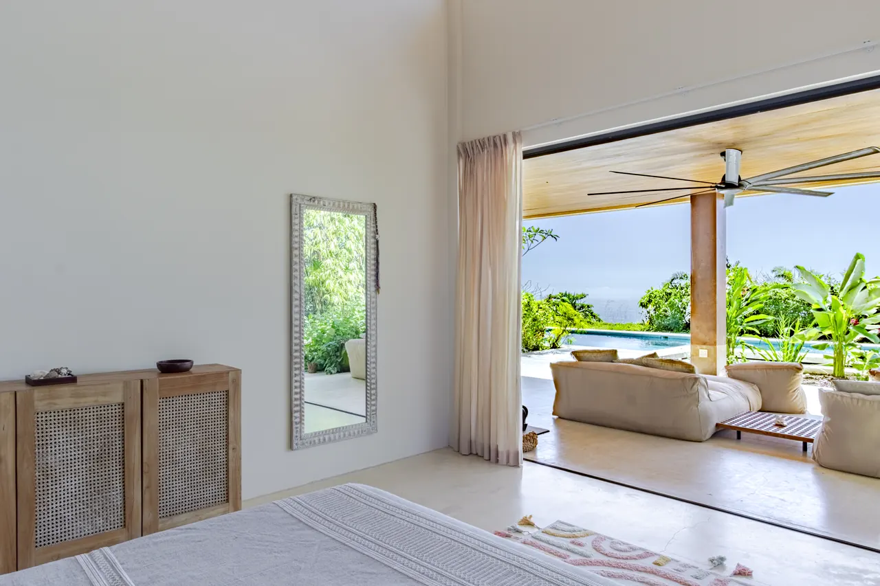 View from a king bedroom onto the shaded lounge terrace